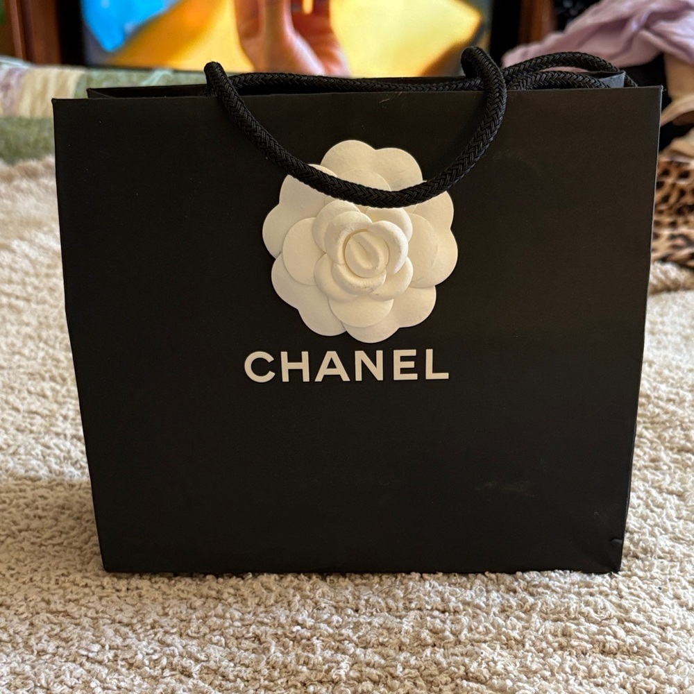 CHANEL Black Shopping Bag with White Camellia Motif